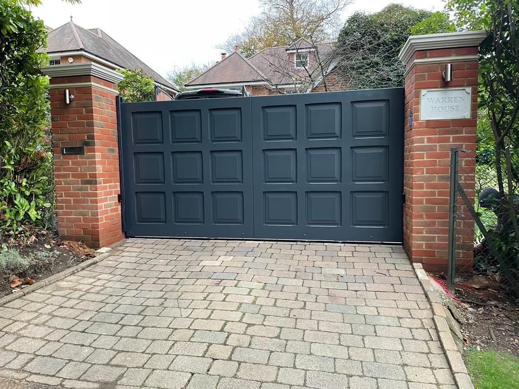 Electric gate with brick columns