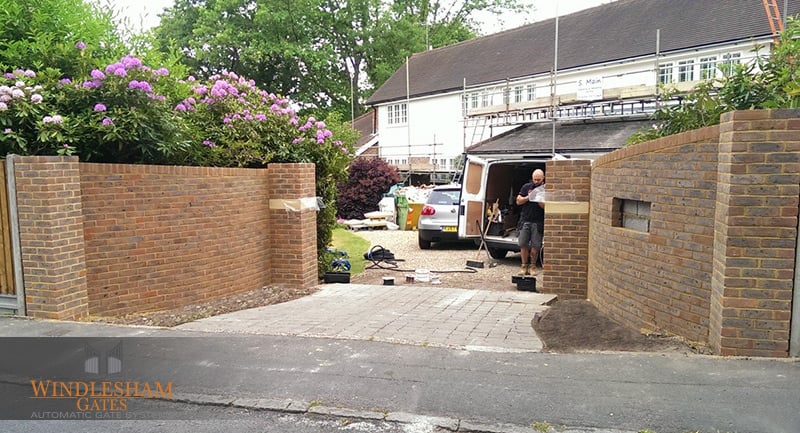 Windlesham Gates employee installing driveway gates